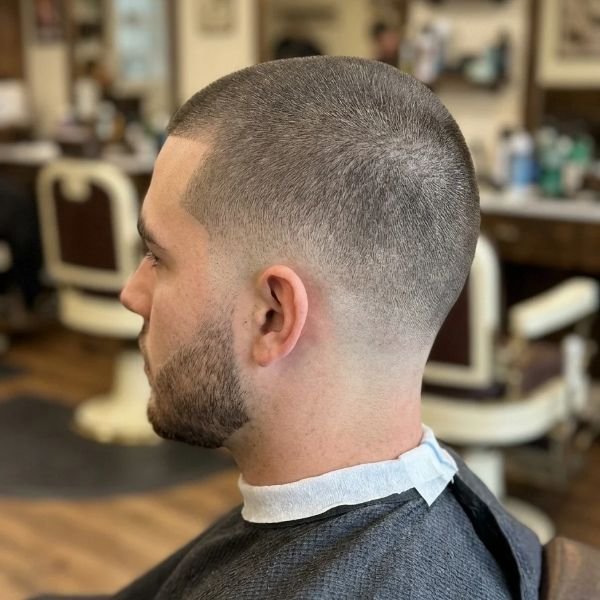 Skin Buzz with Mid Taper Fade